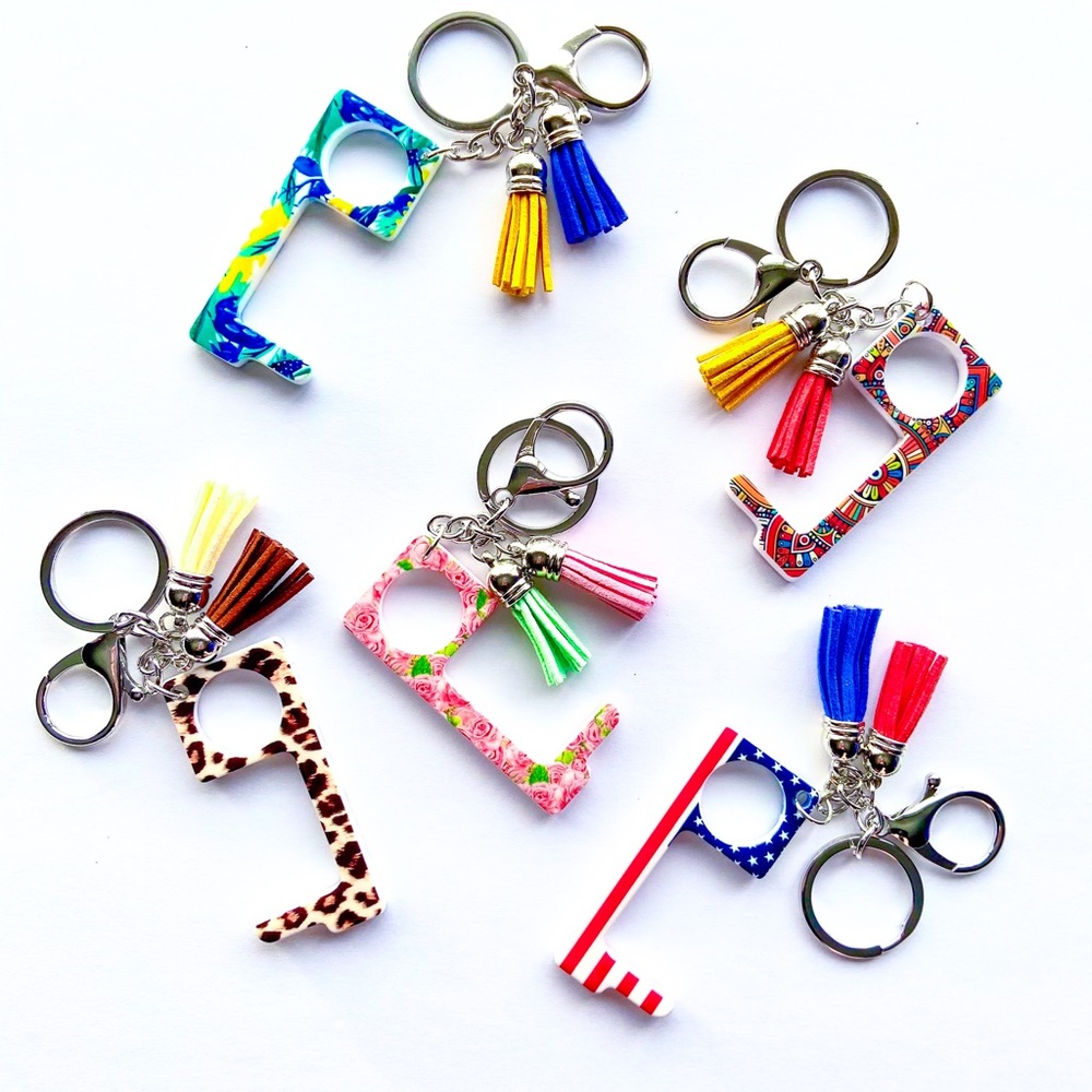 Contactless keychain/door opener